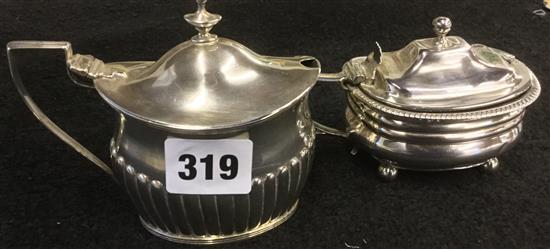 George III silver mustard pot and a similar fluted oval pot